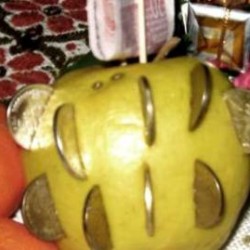 Jabuka s kovanicama za umivanje na Sveta Tri Kralja